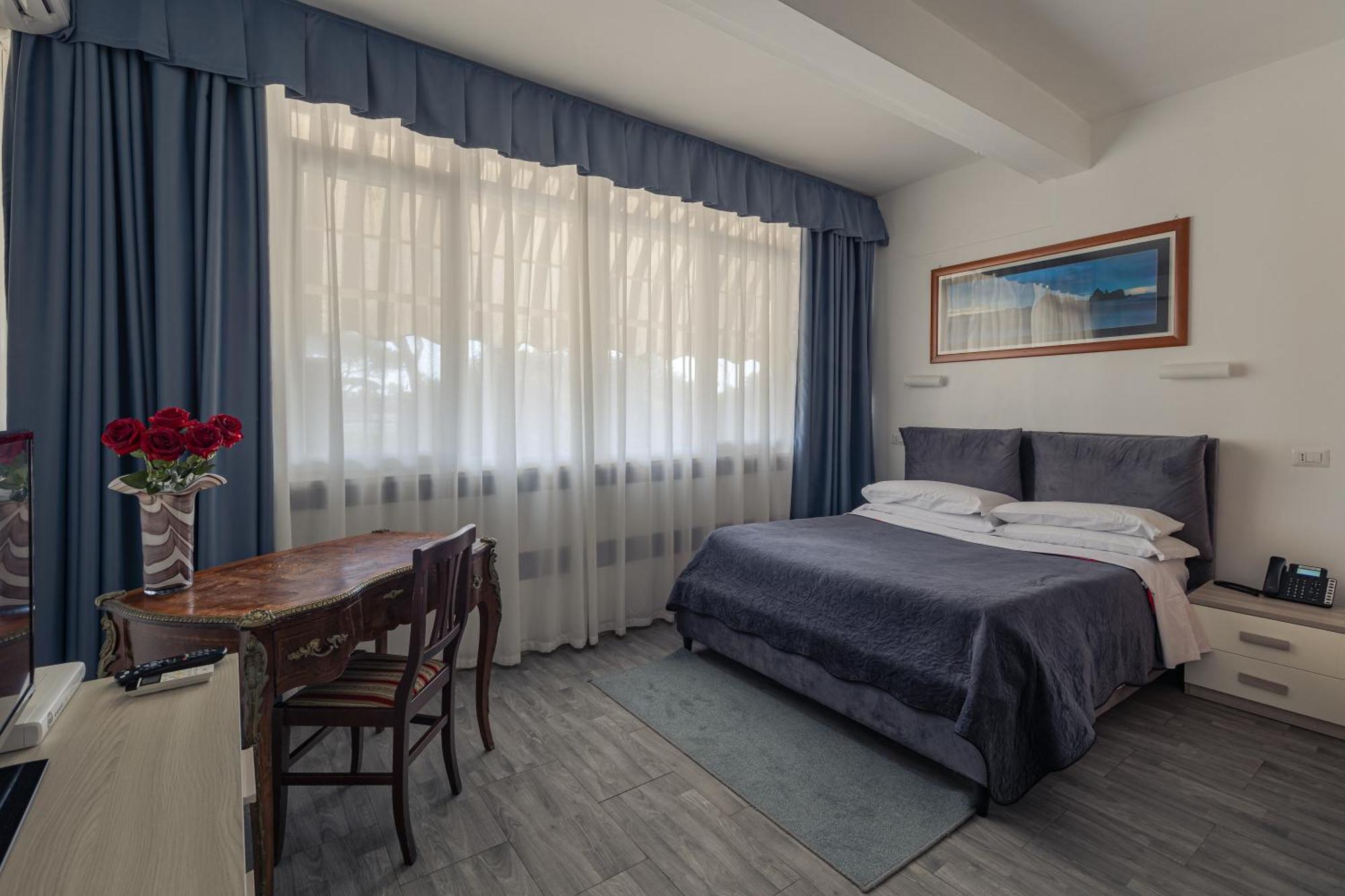 Hotel Giulietta E Romeo Casal Palocco Bagian luar foto